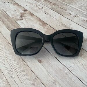Black Gucci Sunglasses.